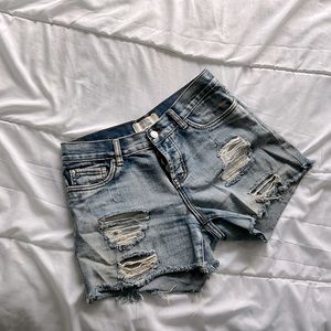 Distressed denim cut offs